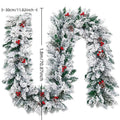 Christmas rattan-style PVC garland with white flocked snow detailing in coiled display