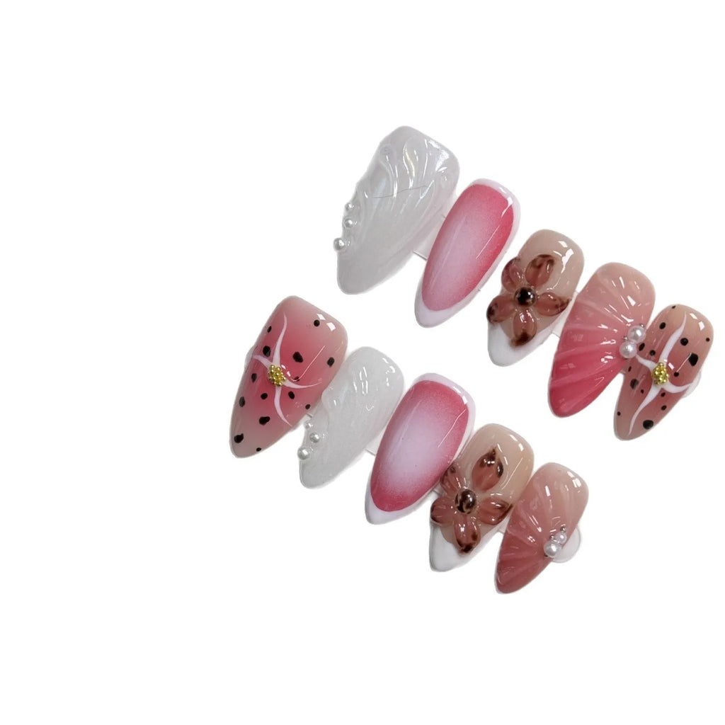 Hand-painted 3D nail patches with embossed candy patterns in almond shape on plastic armour suit