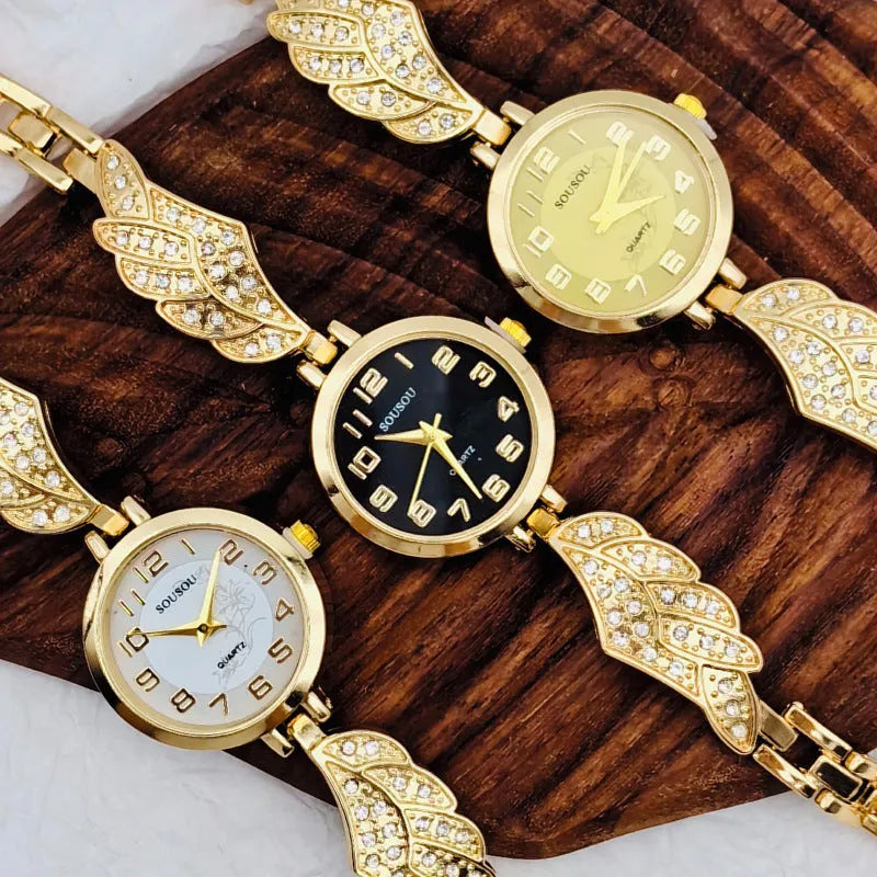 Women's stainless steel watch with round dial on wrist, showing gold surface colour option.