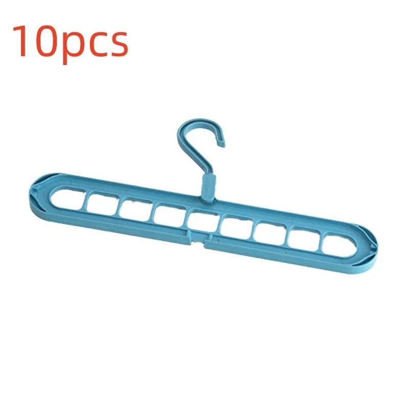 Plastic nine-hole hanger in beige colour showing seamless folding design for trousers