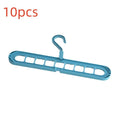 Plastic nine-hole hanger in beige colour showing seamless folding design for trousers