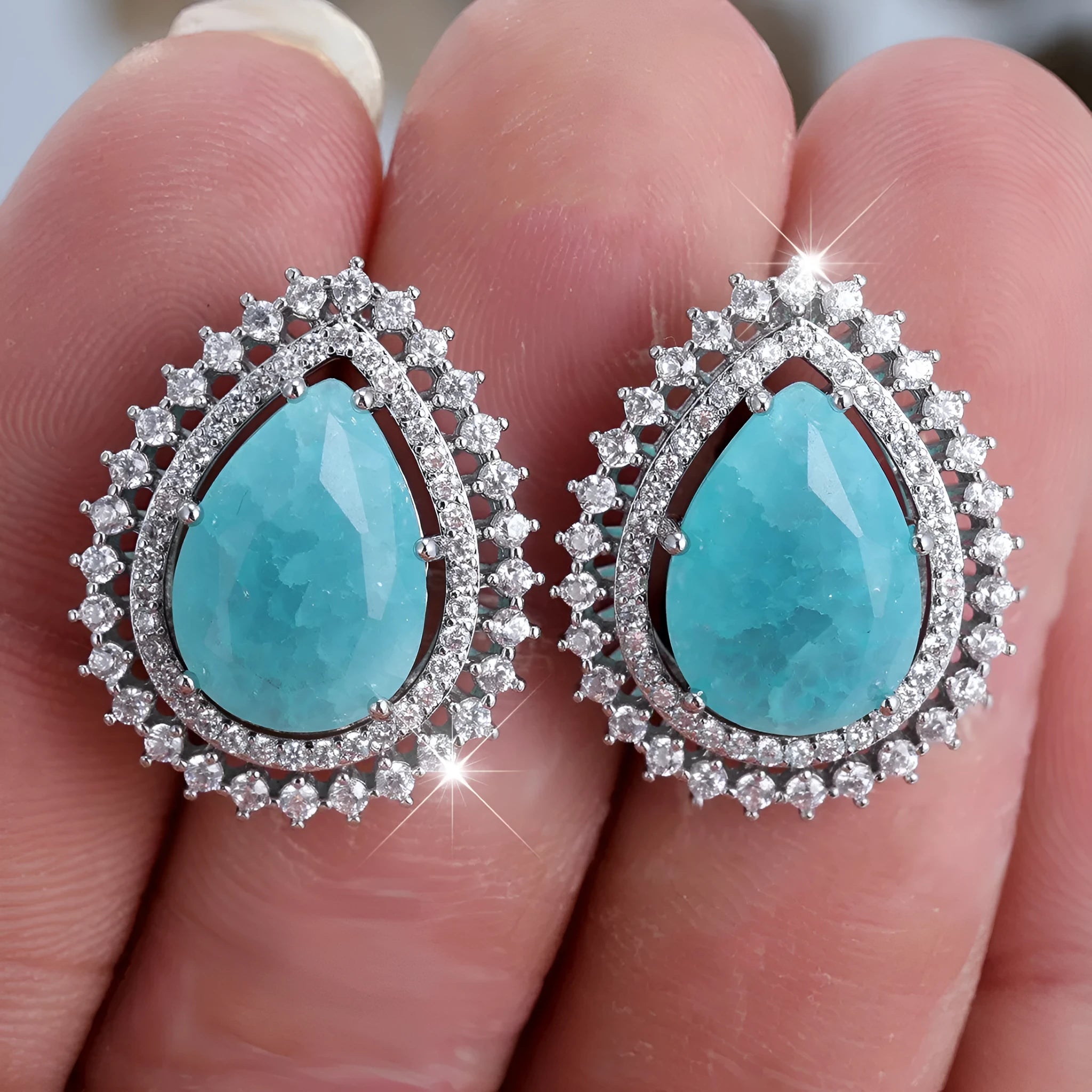 Pair of platinum ice flower diamond drop earrings with heart-shaped copper base