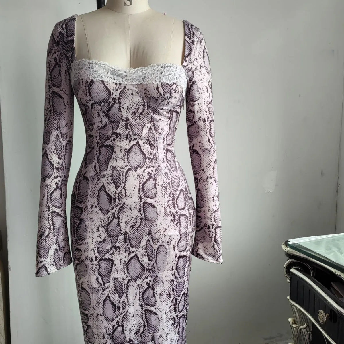 Grey women's A-line dress with 3D digital print pattern and lace detailing, long sleeves, slim fit.