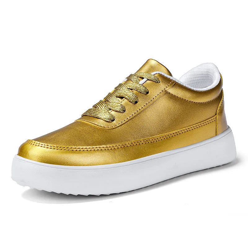 Women's white leather lace-up flat casual shoes shown from the side.