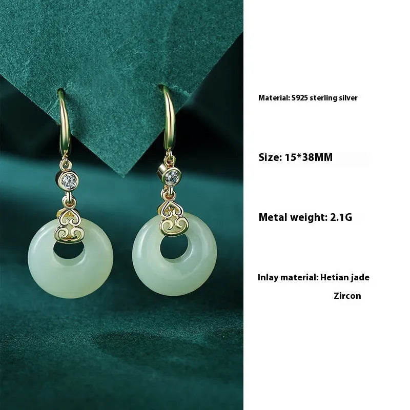 Hetian jade gourd bracelet set in 925 sterling silver with peace buckle and Fu character motifs on white background