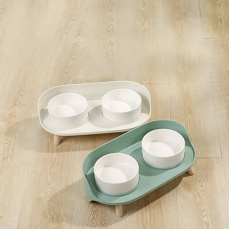 Green tilted double pet bowl set with adjustable angle for cats and small dogs