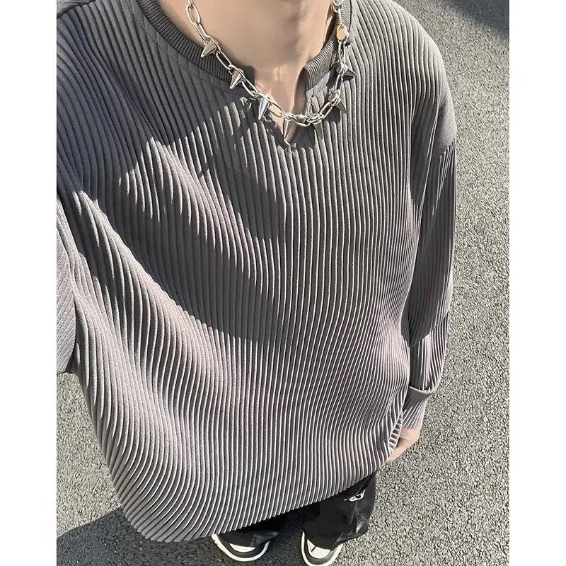 Plus size women's striped texture draping solid colour pullover top in black, loose fit, long sleeves, polyester knit