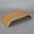 Walnut wood laptop stand with bamboo leather colour finish, 23x51x9cm dimensions, on a desk