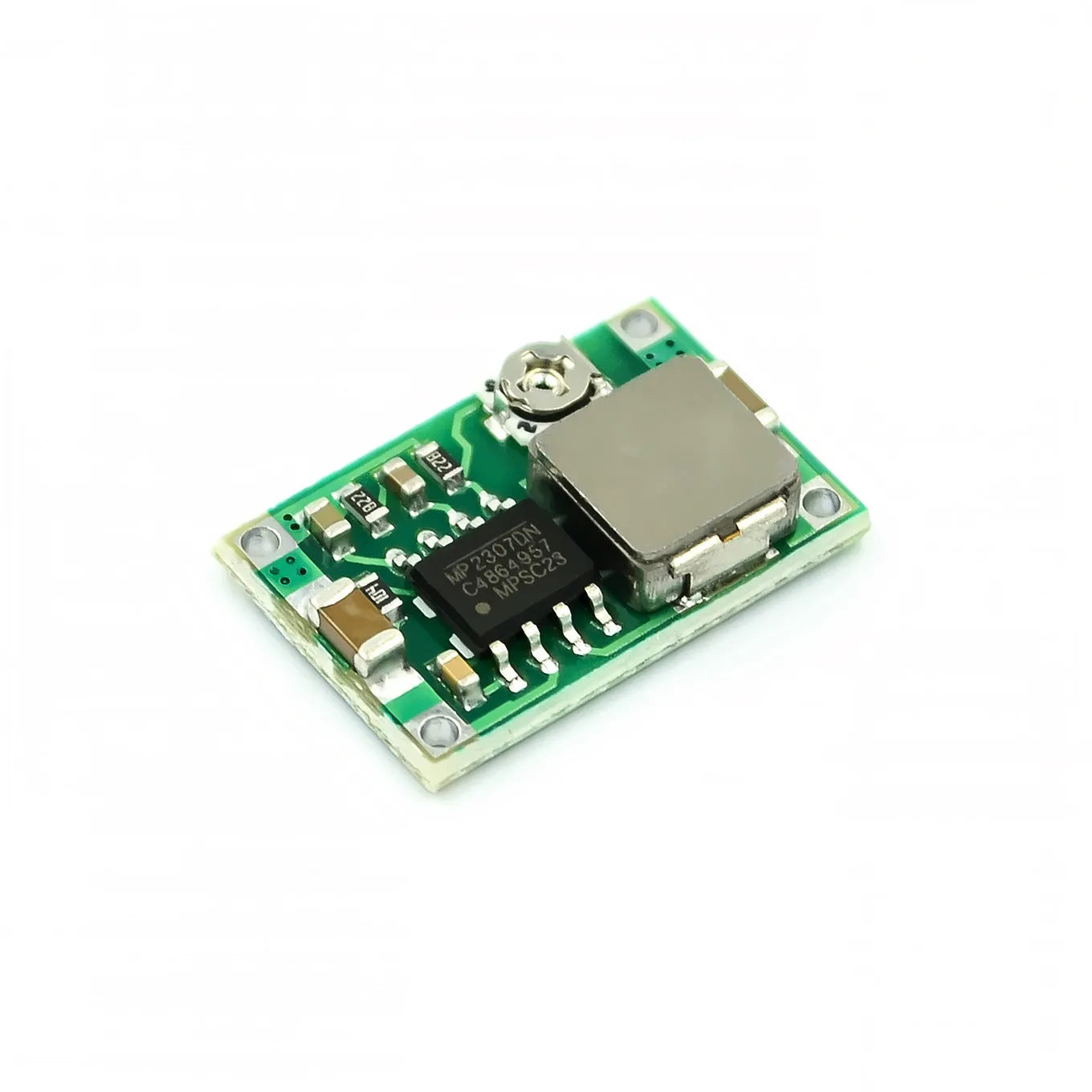 Mini 360 DC-DC buck converter module on green PCB with compact layout showing input and output pads