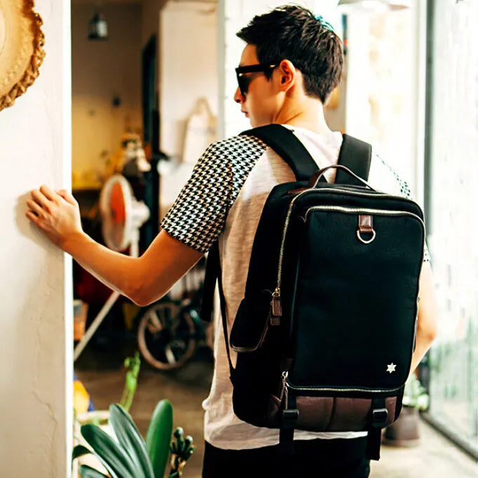 Men's large capacity backpack in Oxford cloth, shown in Army Green colour, dimensions 30cm wide by 46cm high.