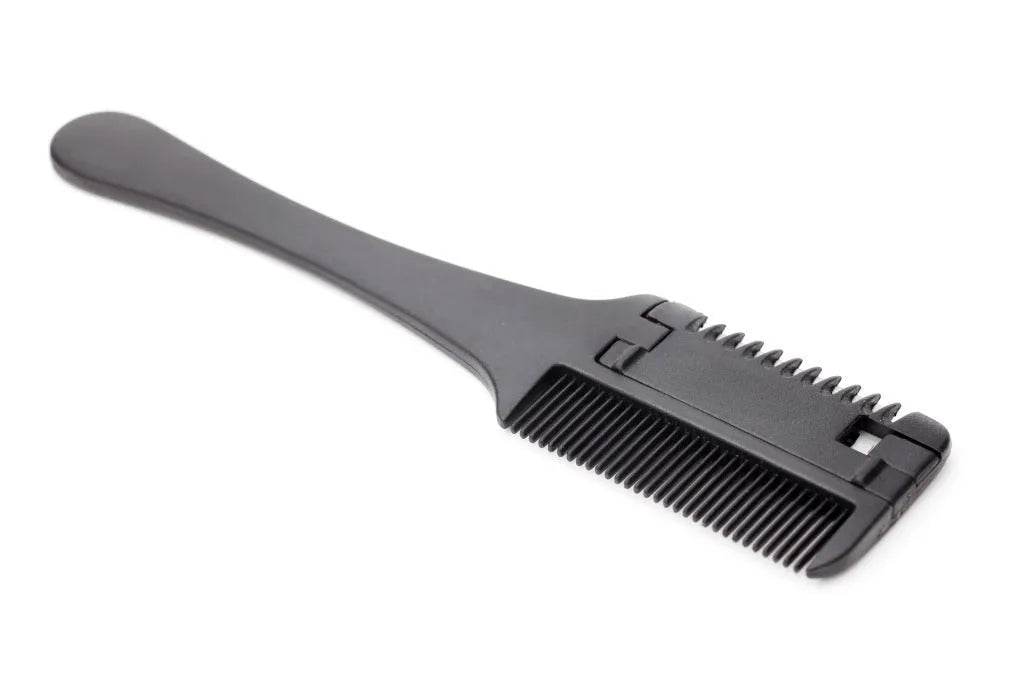 Silver 2-in-1 dog and cat razor comb with comb teeth and trimming blade, shown with spare blades.
