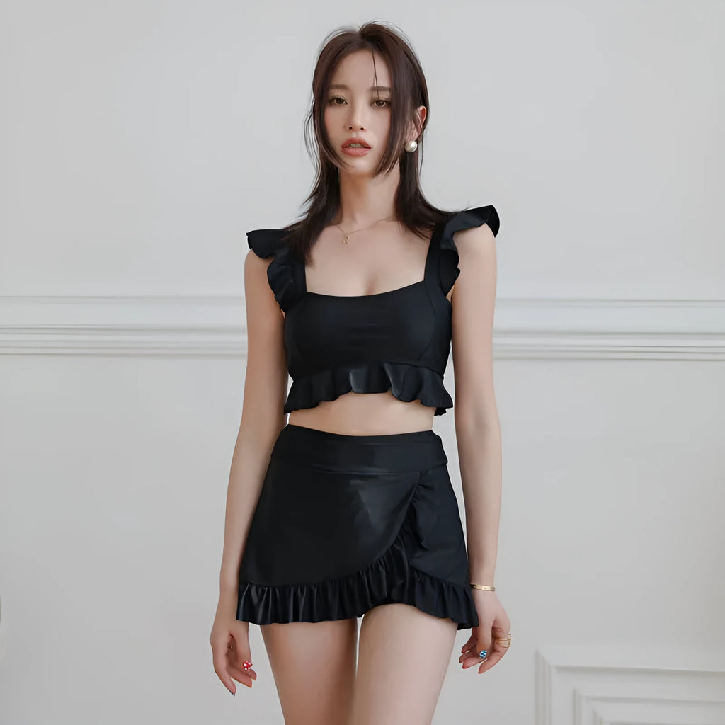 Women's black nylon split swimsuit brief style for swimming and wading flat lay
