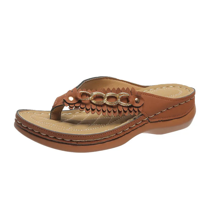 Women's anti-slip wedge sandals with chain detail in black, dark brown, and red on a light background