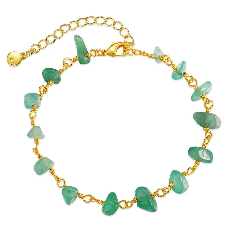 Geometric women's bracelet with irregular natural gravel turquoise stones and crystal elements on 18K copper