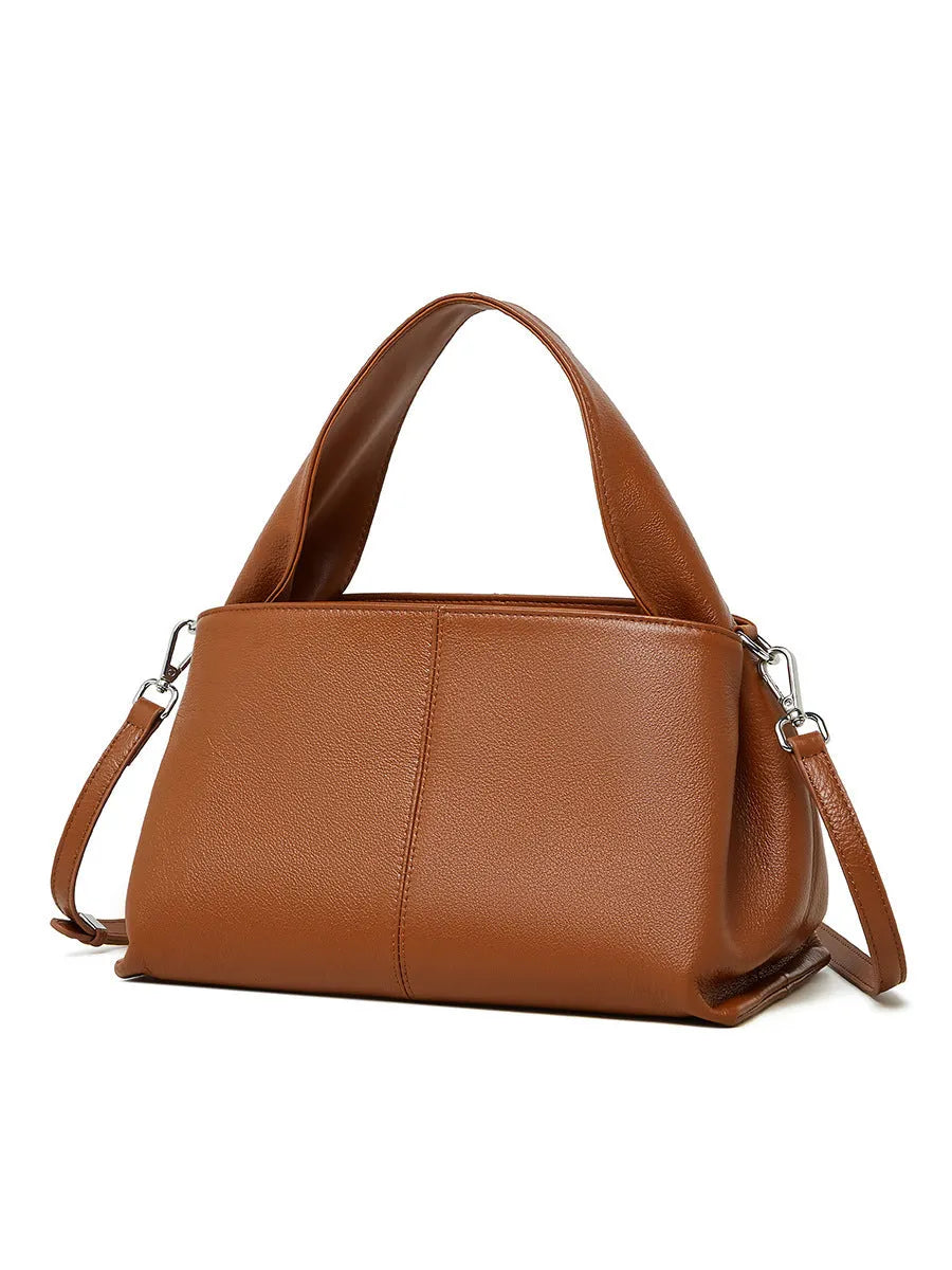 Women's cowhide messenger bag with retro texture in horizontal square shape showing double shoulder straps