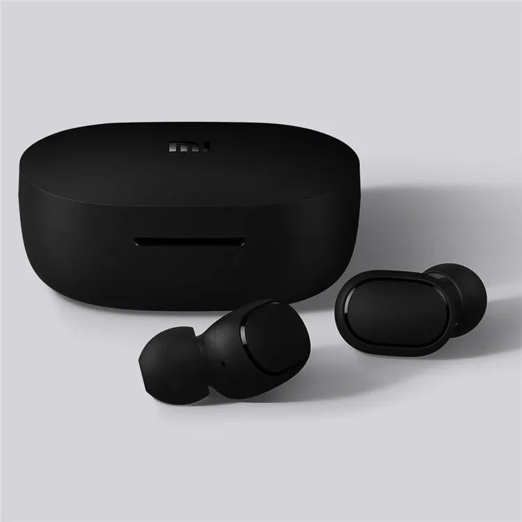 Redmi AirDots True Wireless black earbuds and charging case on a white background.
