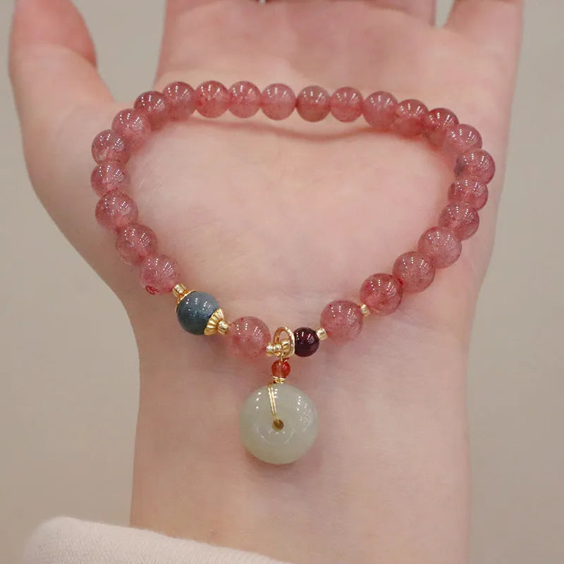 Geometric purse-style strawberry quartz bracelet for women with a peace buckle and safety clasp.