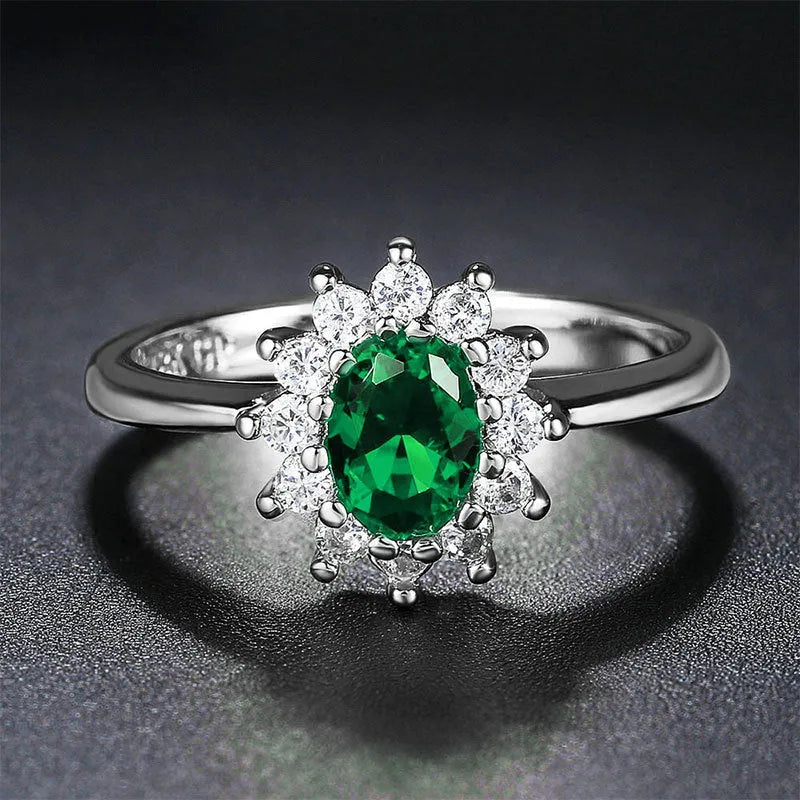 Blue moissanite flower-shaped copper ring for women on a ring size chart showing sizes 6 to 10.