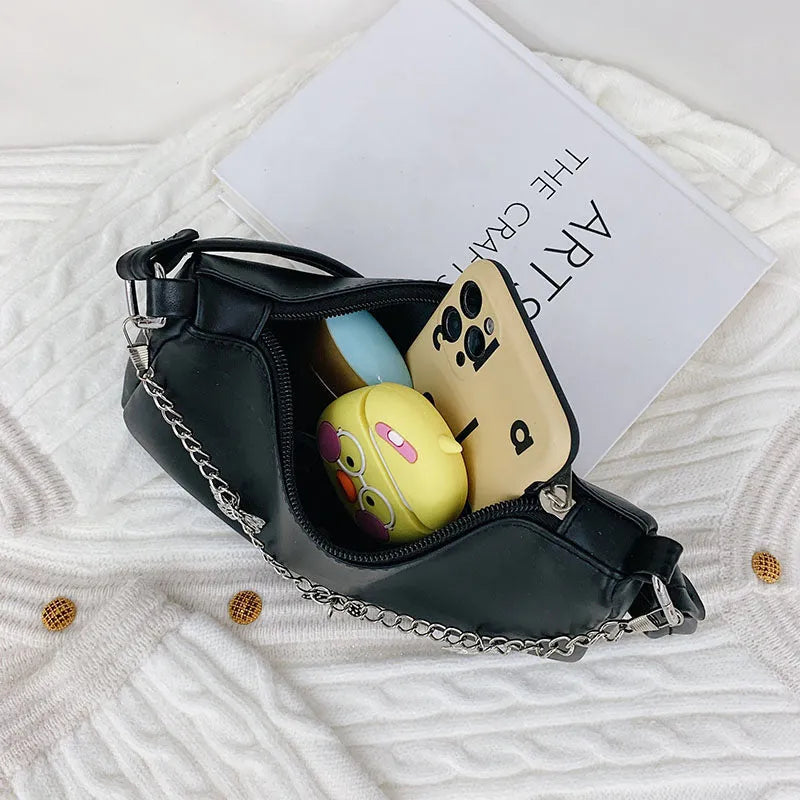 Black PU leather butterfly chain crossbody bag with a square shape and outer pocket.