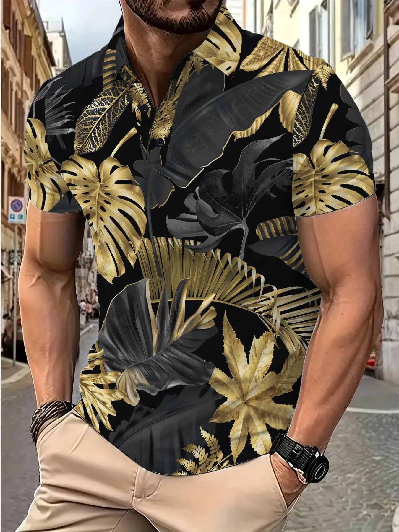 Men's gold tropical plant pattern short sleeve printed shirt on display