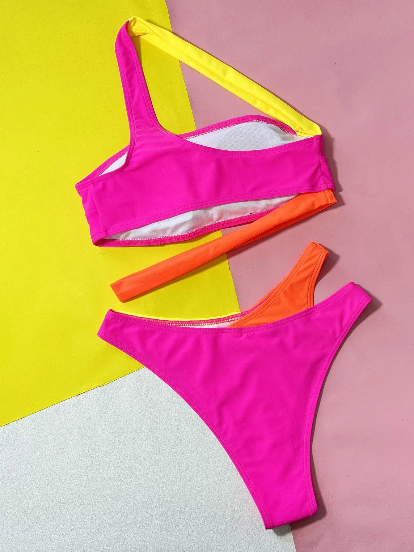 Rose Red hollow contrast split bikini set with nylon and spandex lining for women