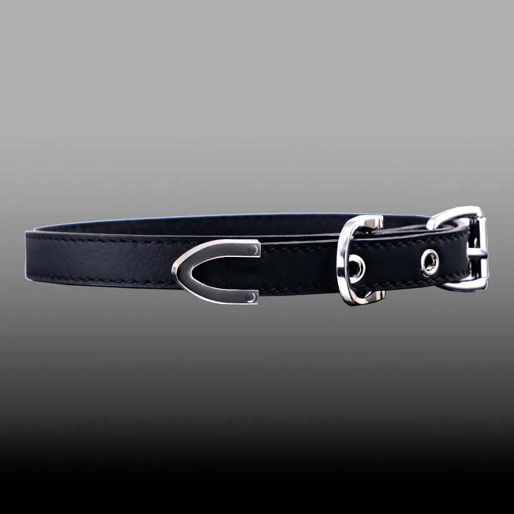 Black genuine leather subculture collar with alloy geometric pendant on dark background