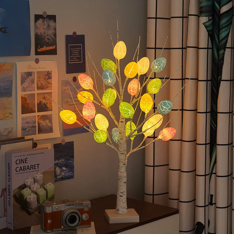 60cm LED birch tree with warm white lights and cracked egg ornaments on a tabletop