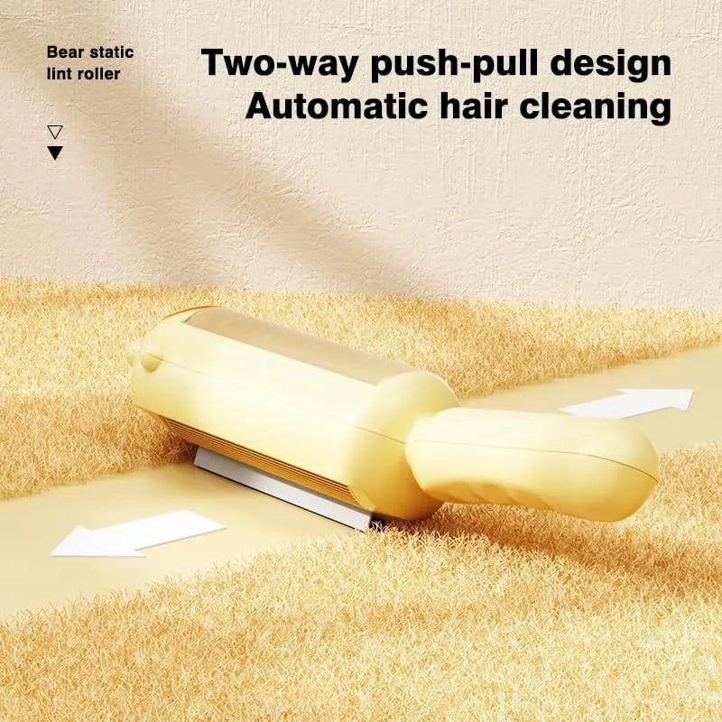 Blue reusable pet hair removal roller with self-cleaning base on a fabric sofa.