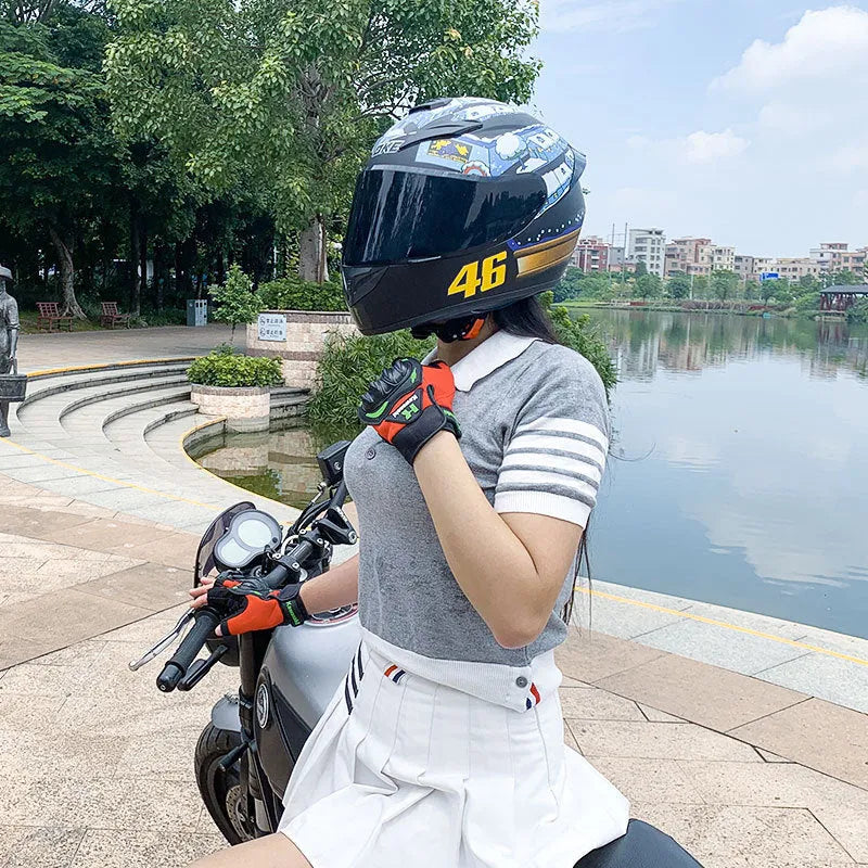 Men's and women's winter motorcycle helmet with ABS shell in dragon graphic colour on white background