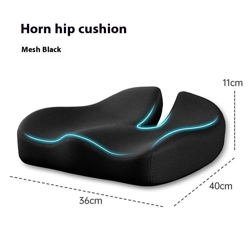 Memory foam office chair cushion in a solid colour, shown on a desk chair for scale.