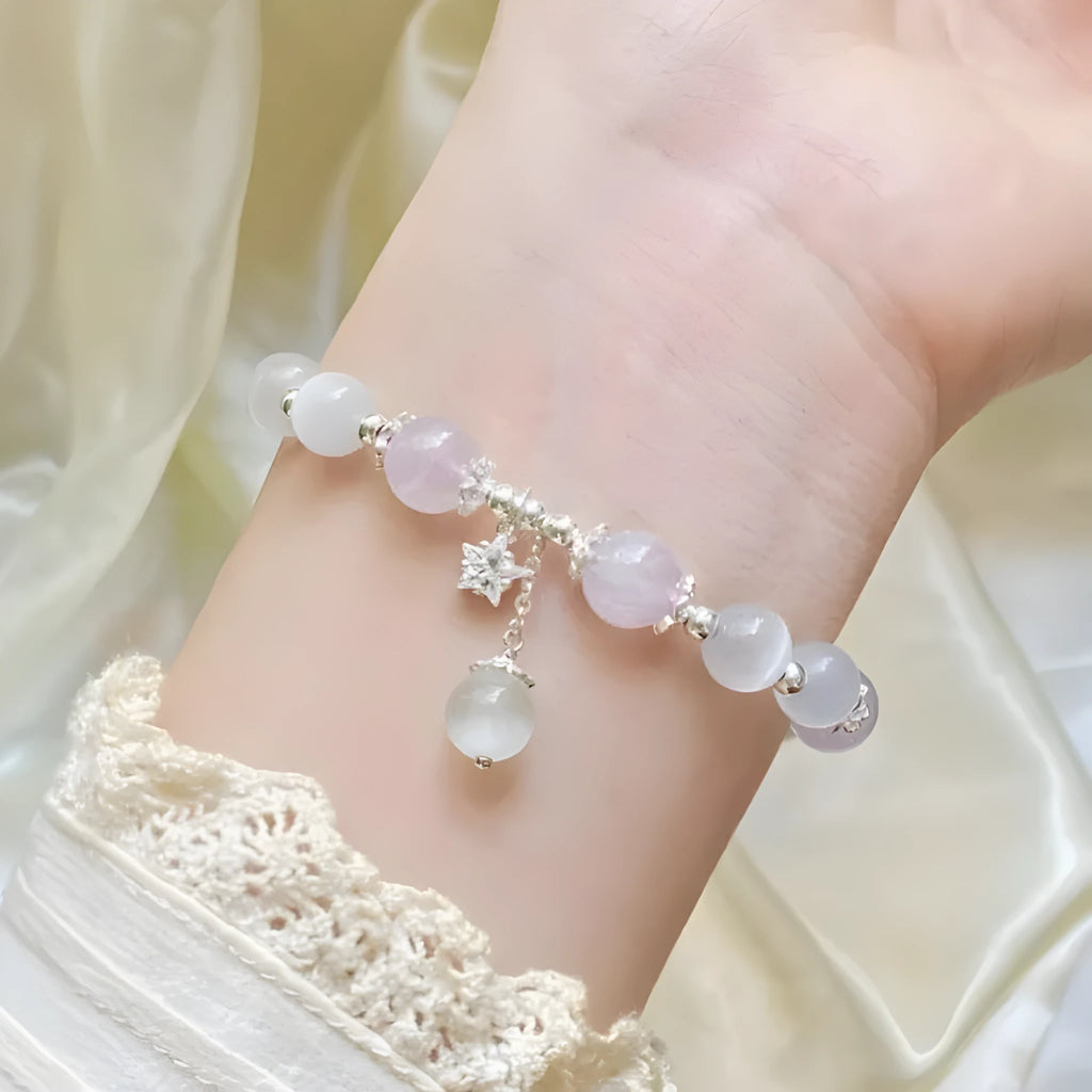 Cute handcrafted crystal bracelet in opal amethyst colour with moon-shaped pendant over 20mm size