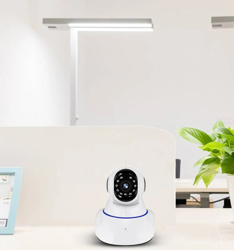 White wireless dome security camera with a 3.6mm lens for HD indoor and outdoor monitoring.