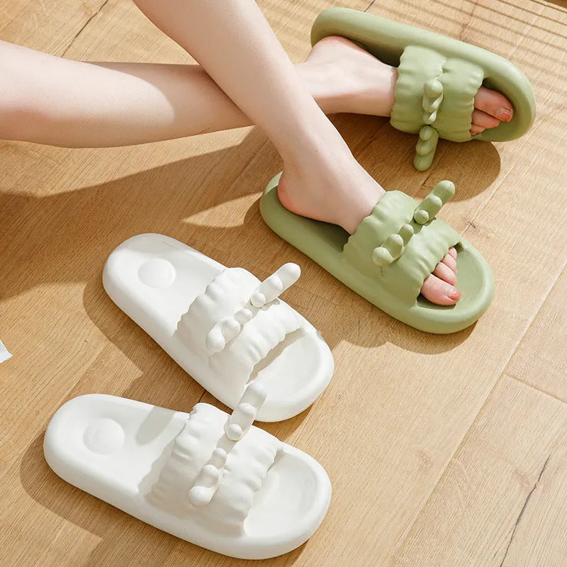 Cute deer horn design EVA flip flop slippers for women and men in light yellow, shown on a non-slip sole.