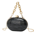 Oval acrylic chain crossbody handbag in pearlescent white with hard shell and three-dimensional pocket