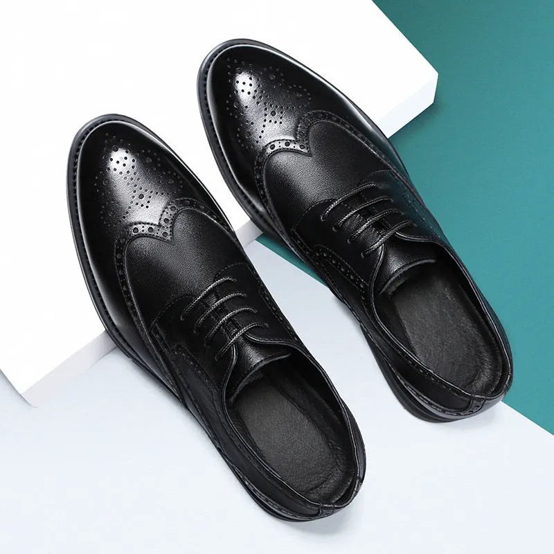 Men's black brogue leather shoes with traditional perforated toe design on business styling