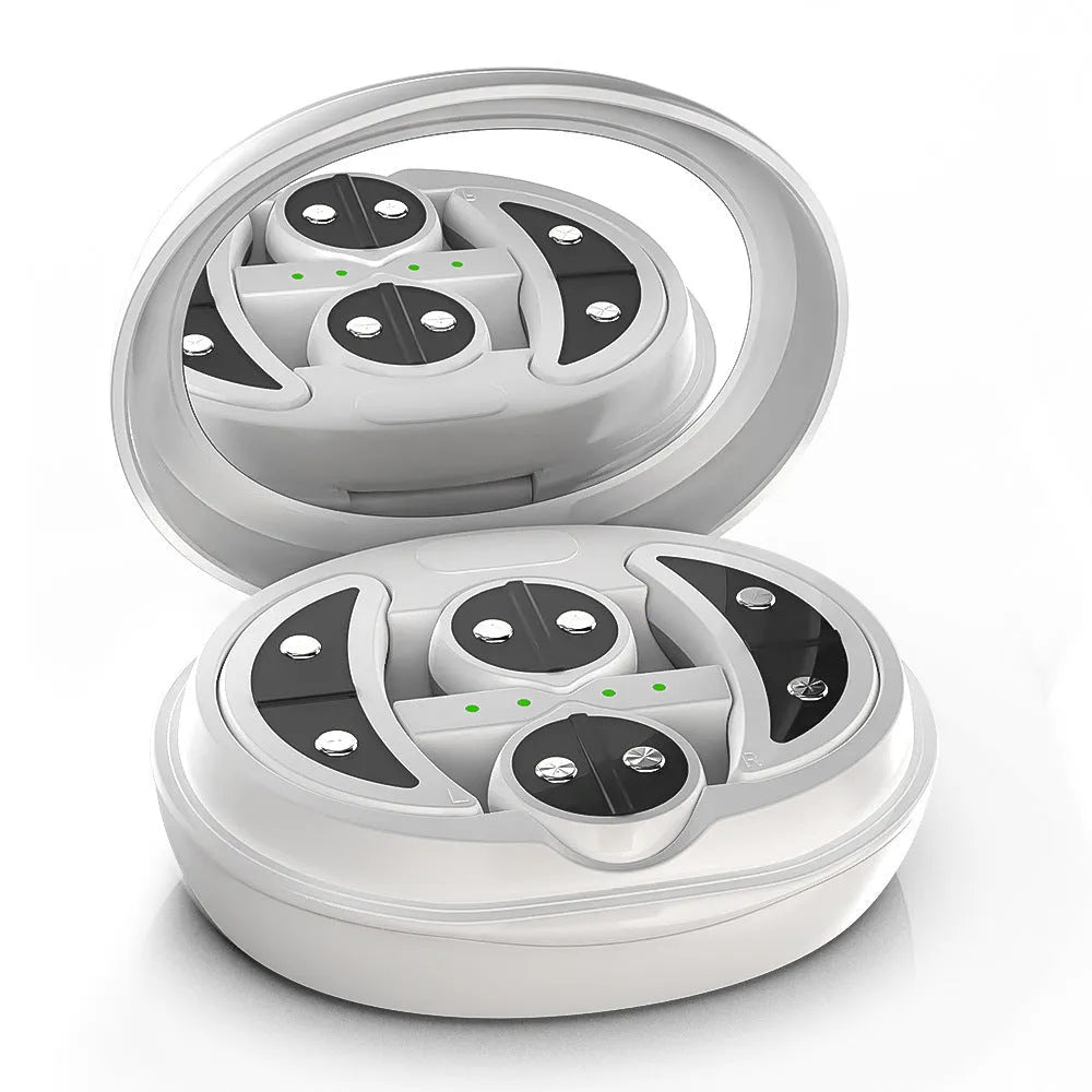 White wireless red light EMS facial and eye massager device on a table