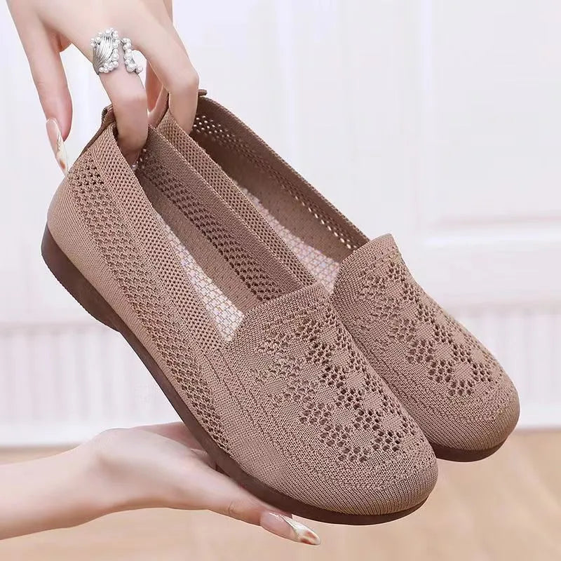 Beige antiskid walking shoes for women with breathable mesh upper and PVC sole