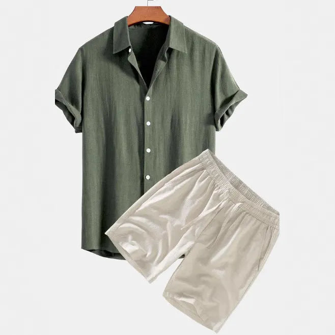 Men's solid colour casual short-sleeved shirt and shorts suit in polyester fibre, side view on model.