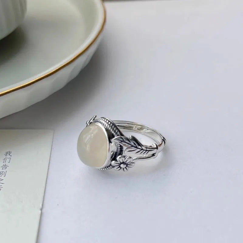 Adjustable opening copper vintage ring with imitation white chalcedony stone and U-shaped design