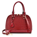 Large shiny black PU crossbody shoulder bag with shell suitcase shape on a white background.