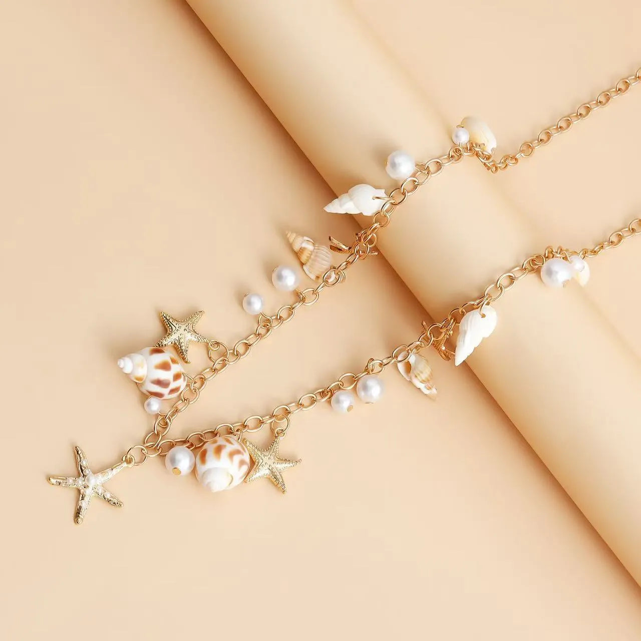 Women's alloy waist chain and matching bracelet set with star design for beach wear
