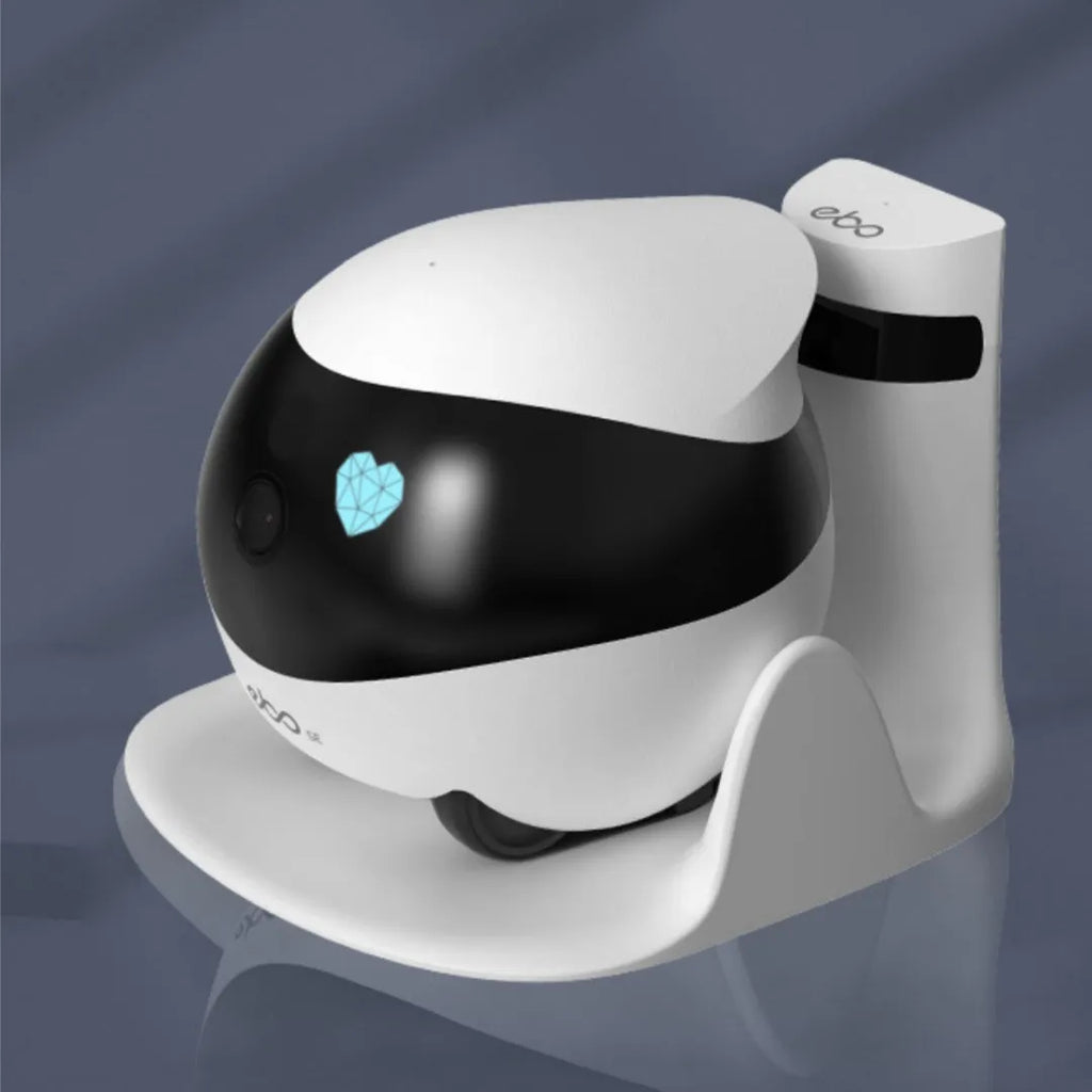 White smart home mobile robot surveillance camera with automatic charging dock