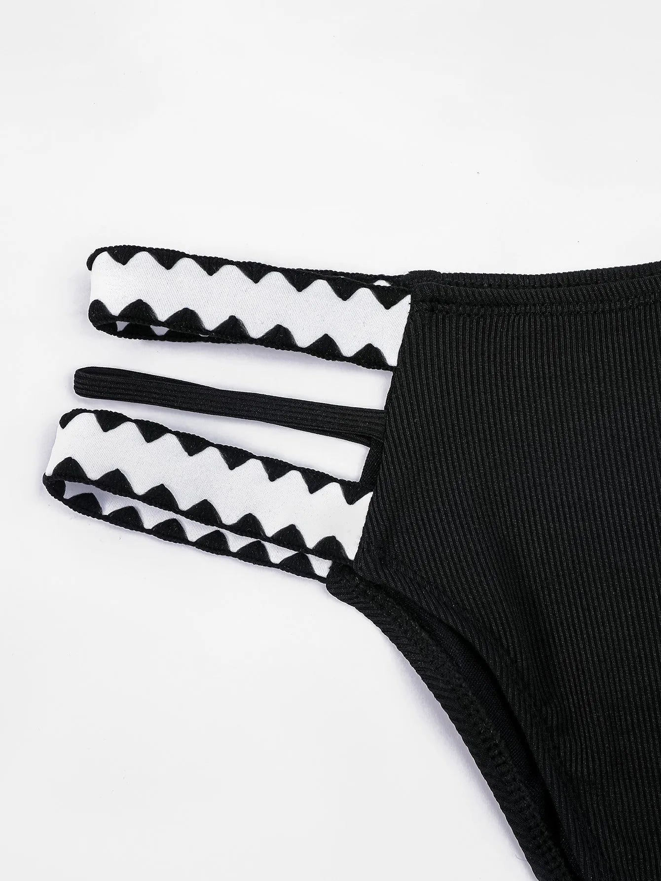 Women's black hollowed-out split swimsuit briefs made of polyester for swimming and wading