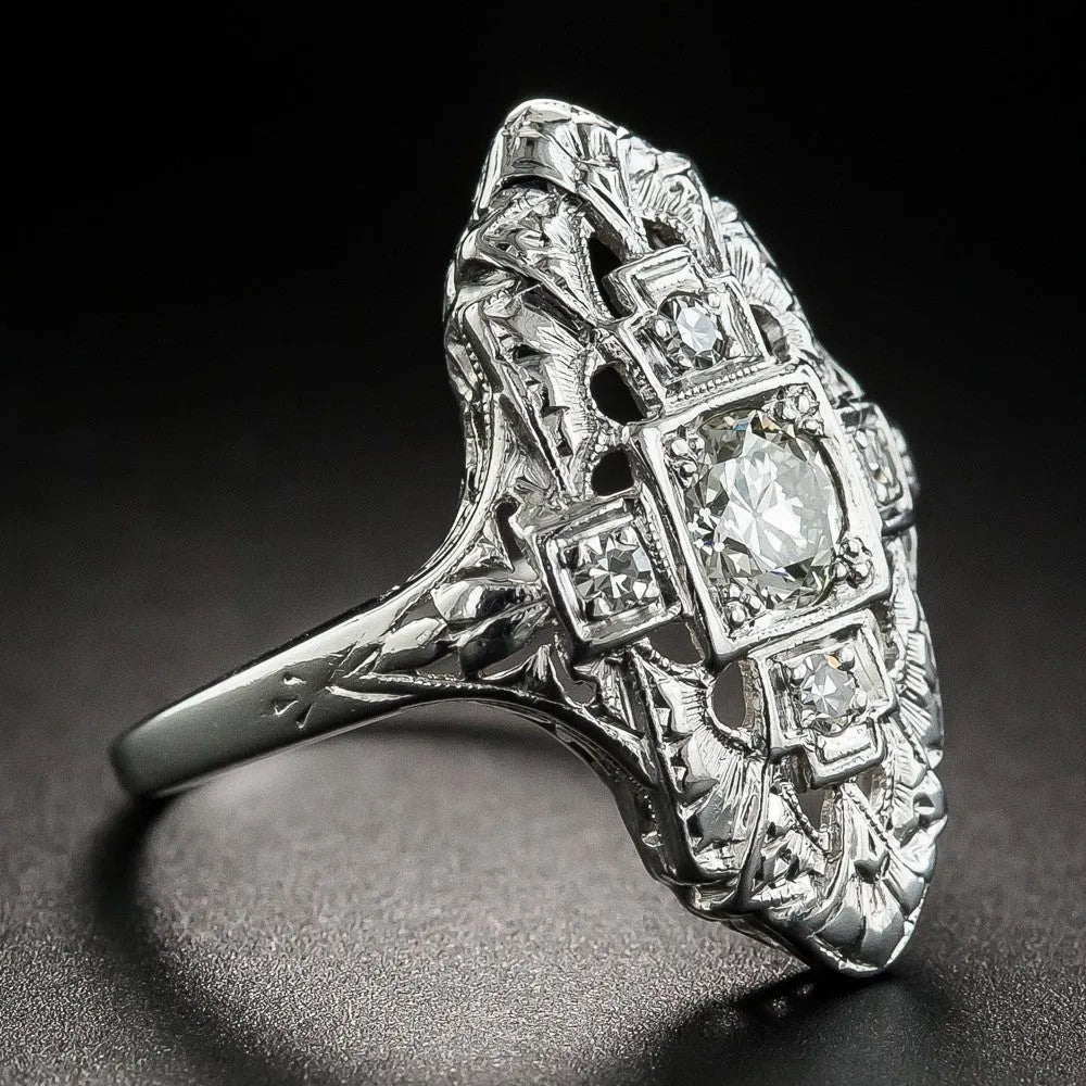 Hollow out geometric silver-colour ring with diamond studs on copper base.