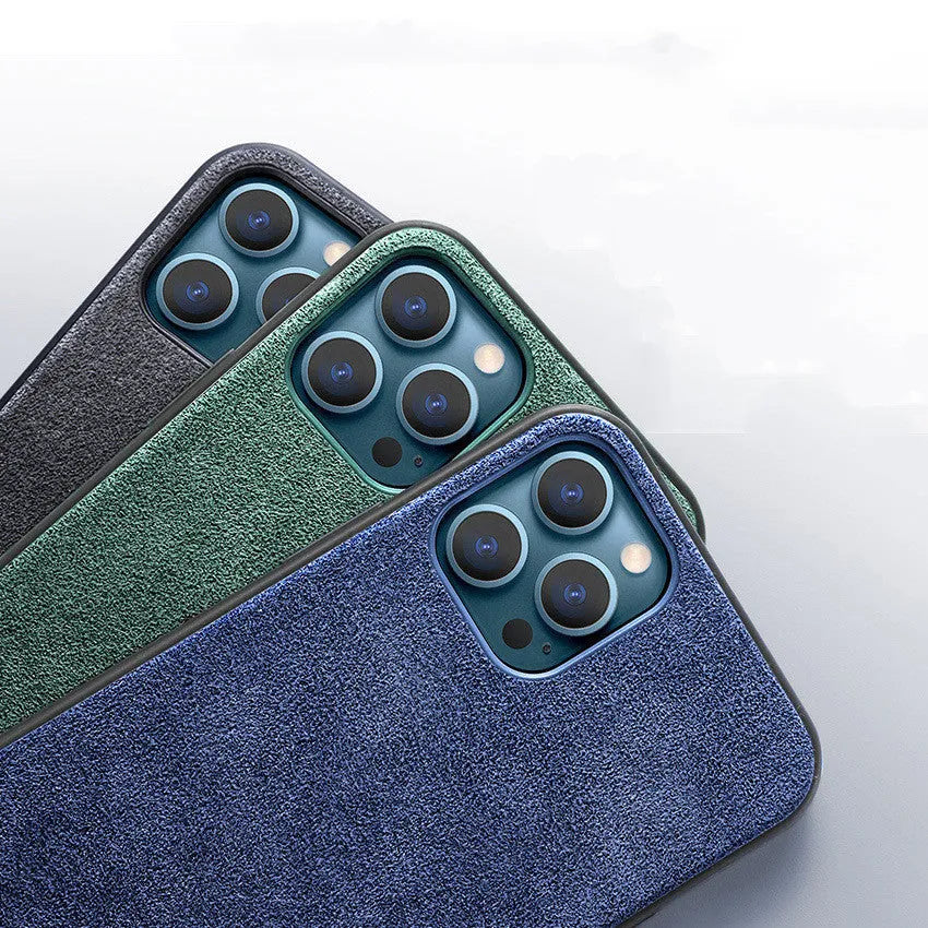 Suede mobile phone case for iPhone in elegant black, dark night green, and dark blue colours.