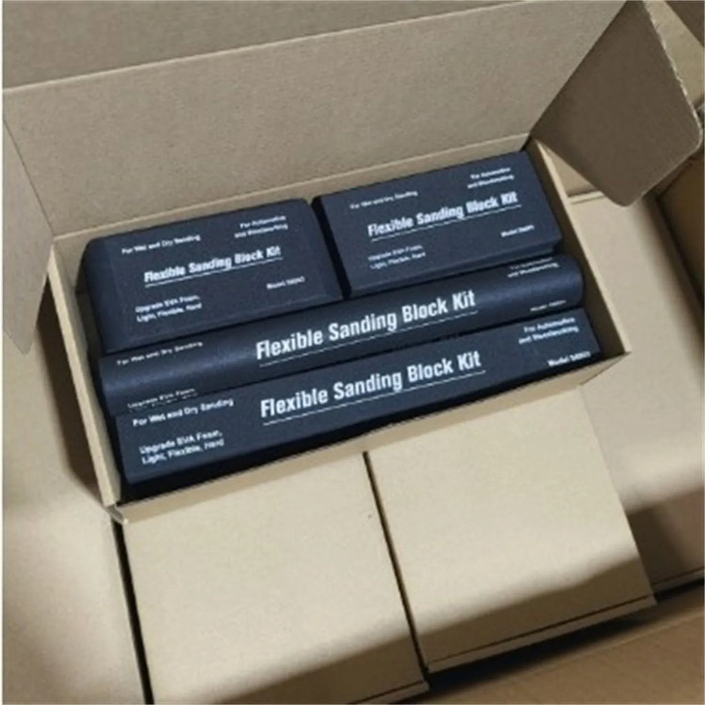 Seven black EVA foam modelling blocks with a frosted texture arranged together.