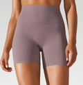 High waist hip lift fitness pants for women, moisture wicking nylon spandex tights in dark green colour