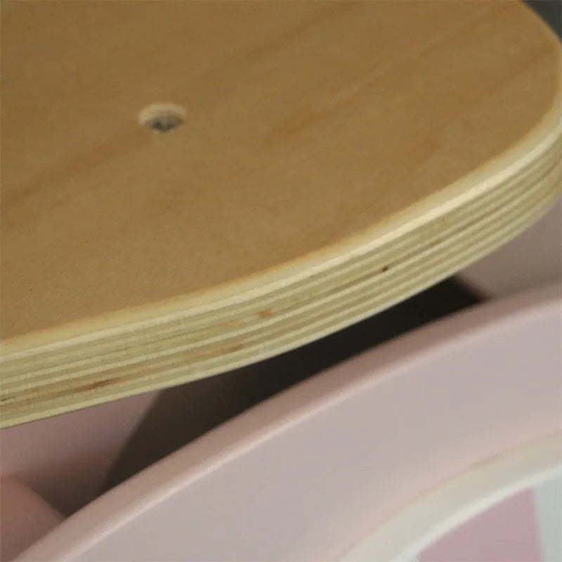 Pink wooden balance scooter with 10-inch wheels for toddlers and young children.