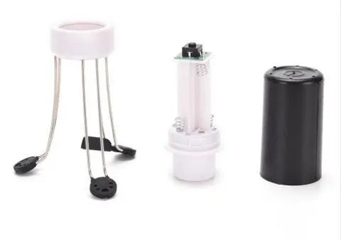 White and black wireless stir crazy mixer with stainless steel shaft on a kitchen countertop