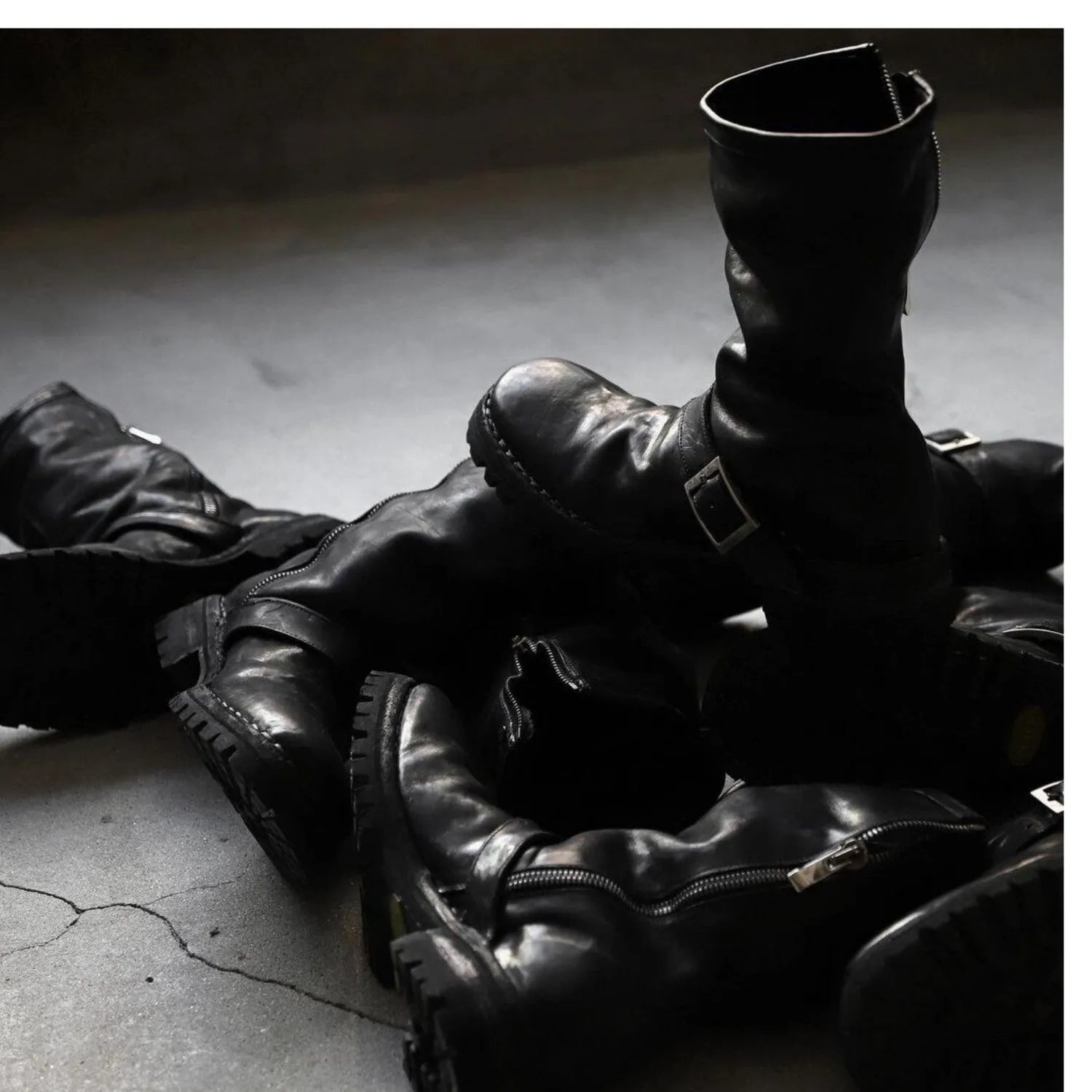 Men's black retro style Martin boots with side zipper closure and round toe